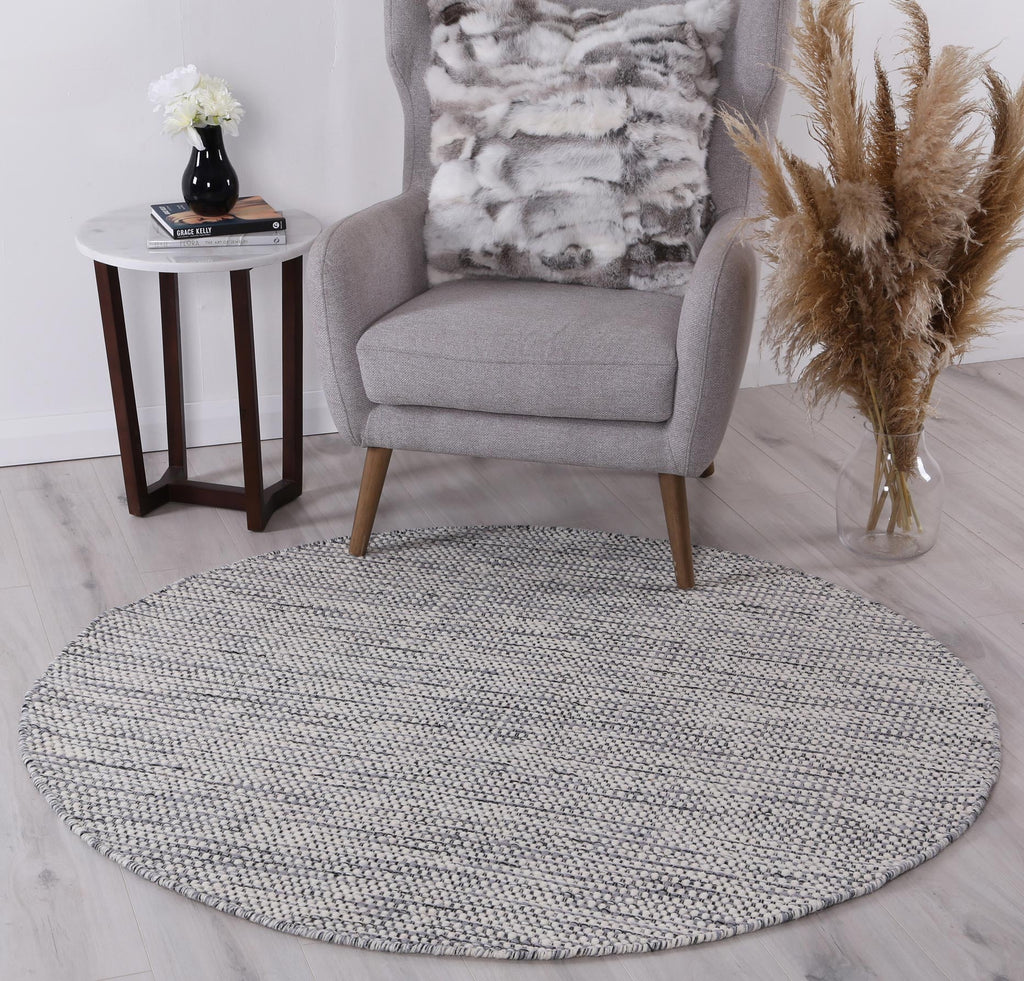 Nordic Grey Reversible Wool Round Rug styled with furniture