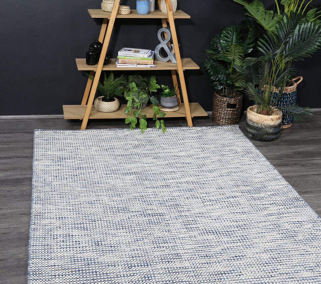 Nordic Blue Reversible Wool Rug styled with furniture