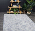Nordic Blue Reversible Wool Rug styled with furniture