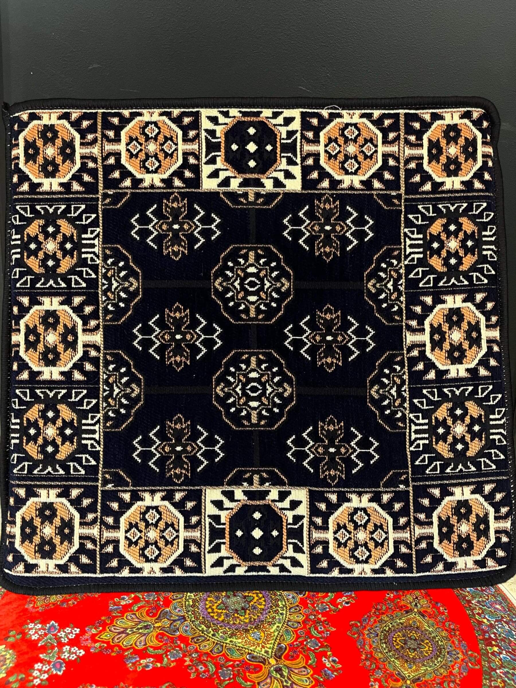 Navy Diamond Ottoman Floor Cushion featuring intricate patterns, perfect for Arabian majlis seating and cultural decor.