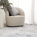 Pierre Cardin Ocean Abstract Blue Rug styled with furniture
