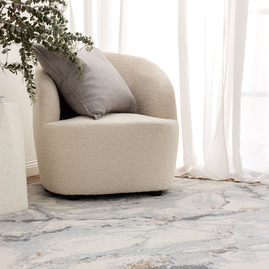 Pierre Cardin Ocean Seaspray Blue Rug styled with furniture