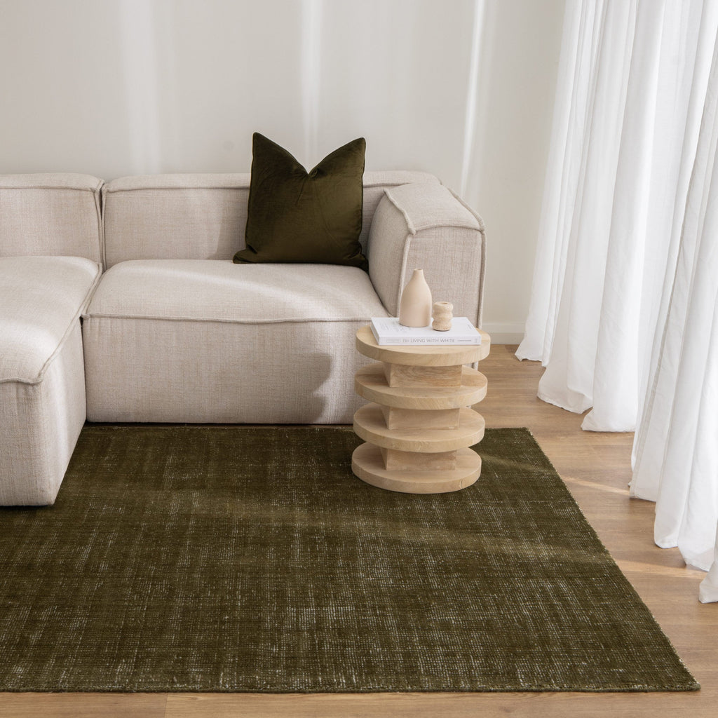 Harbour Olive Green Indoor Outdoor Rug styled with furniture