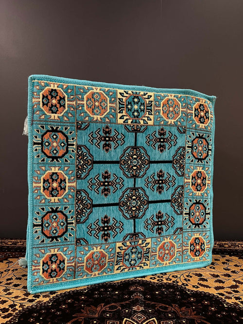 Aqua Diamond Ottoman Floor Cushion featuring intricate blue and orange patterns, ideal for Arabian majlis seating.