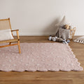 Mellow Blush Pink Rectangular Scalloped Kids Rug styled with furniture