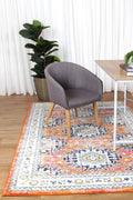 Provence Cannes Orange Transitional Rug - 020 styled with furniture