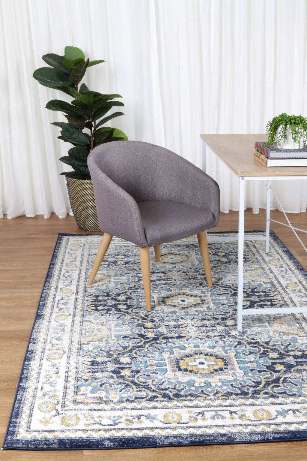 Provence Frejus Blue Transitional Rug - 021 styled with furniture