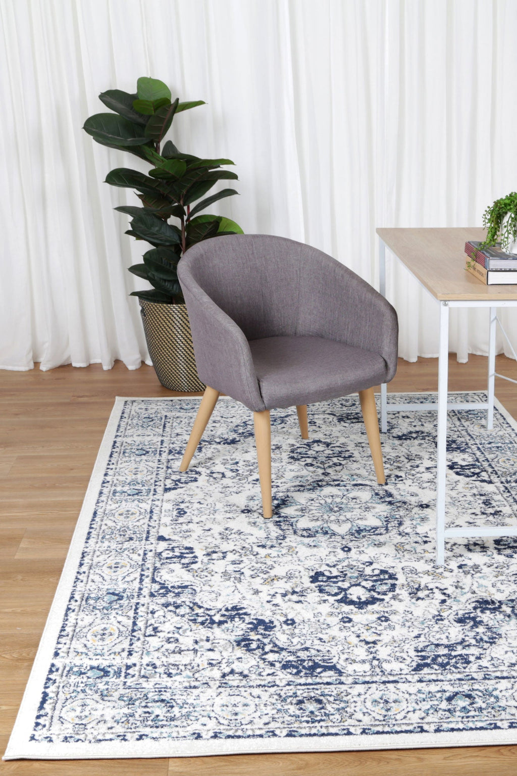 Provence Gruissan Blue & Ivory Transitional Rug - 022 styled with furniture
