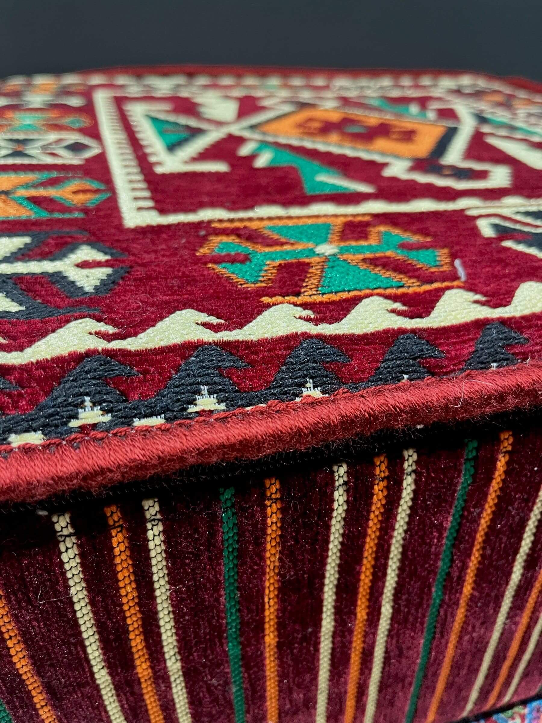 Cushion Table (Maroon with green & orange)This 60x60 cushion table will bring an elegant, luxurious look to your home. Crafted from Turkish fabrics with a solid sponge interior, this table is stylish and built to last. It's beautiful designs and tradition