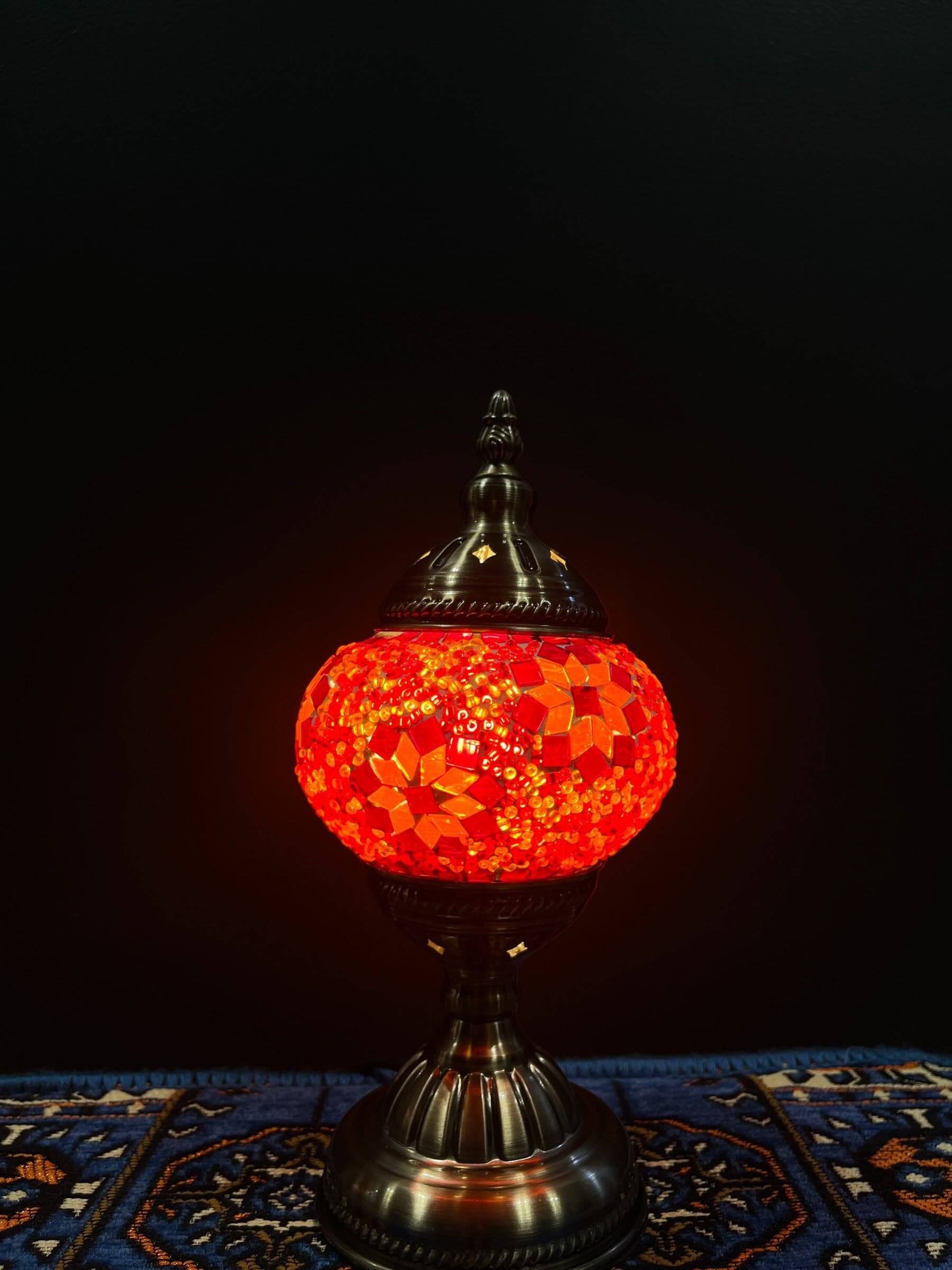 Mosaic Table Lamp Orange FlowerMosaic Lamps: Unique and elegant decorative lighting fixtures featuring mosaic designs crafted from vibrant glass pieces. Add a touch of grace and charm to your space with these exquisite lamps, suitable for various settings