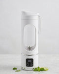 Portable Juicing Cup HS-860 – Rechargeable Personal Blender 450ml in white color with digital display.