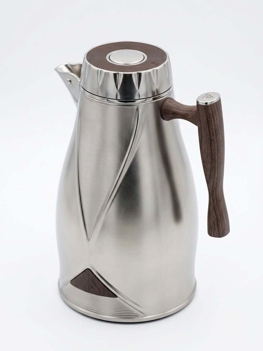 Premium thermal carafe with sleek stainless steel design and wooden handle for elegant serving.