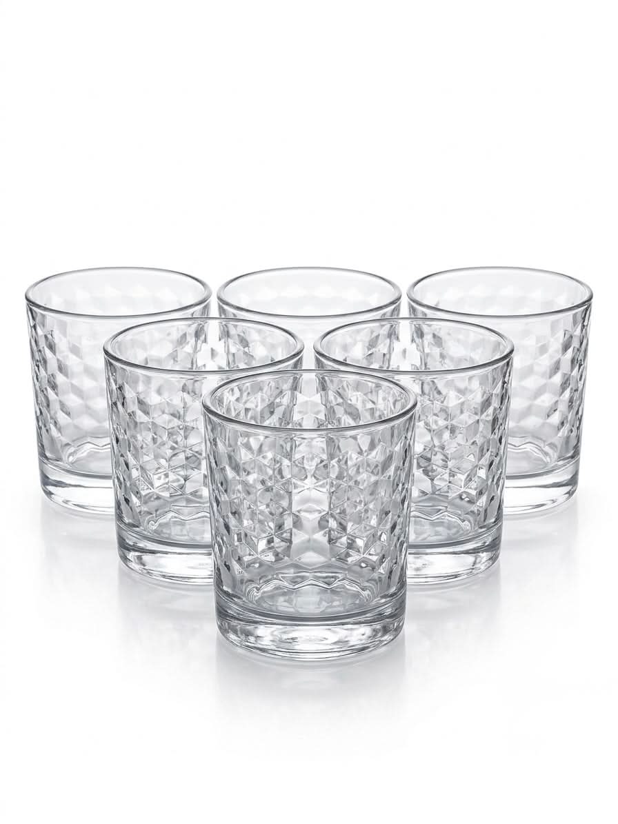 Premium geometric whiskey glass set featuring diamond-cut pattern, perfect for home bar and entertaining.