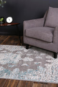 Rapsody Bizet Blue Traditional Rug - 03BLUE styled with furniture