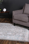 Rapsody Handel Blue Transitional Rug - 06BLUE styled with furniture