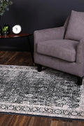 Rapsody Liszt Navy Transitional Rug - 07NAVY styled with furniture