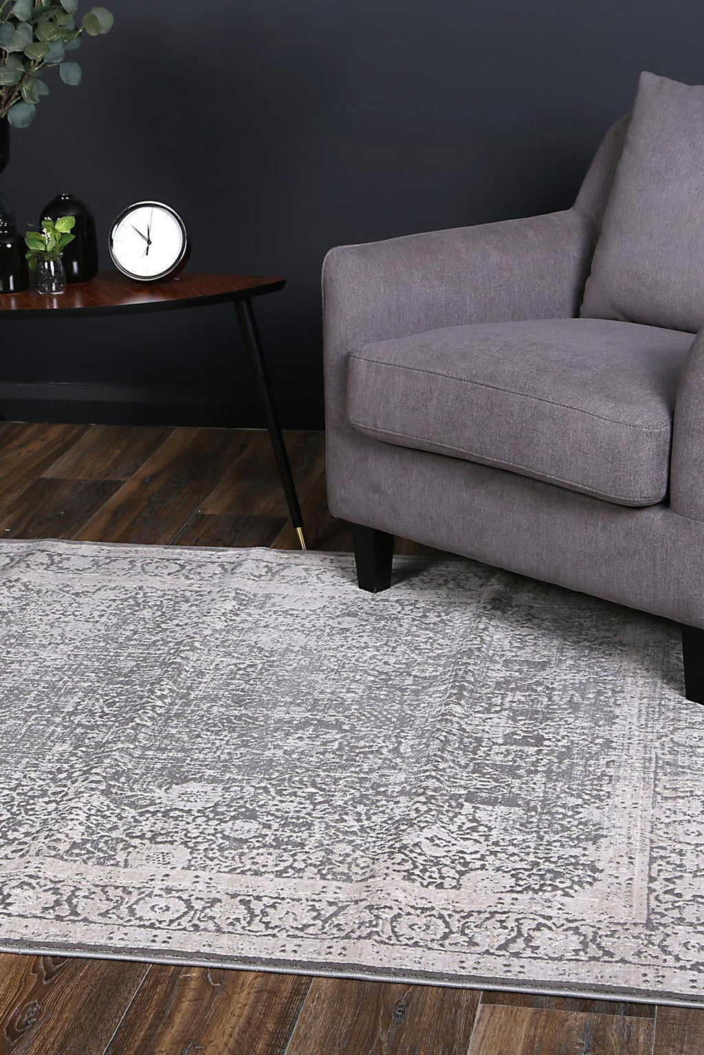 Rapsody Liszt Grey Transitional Rug - 08GREY styled with furniture