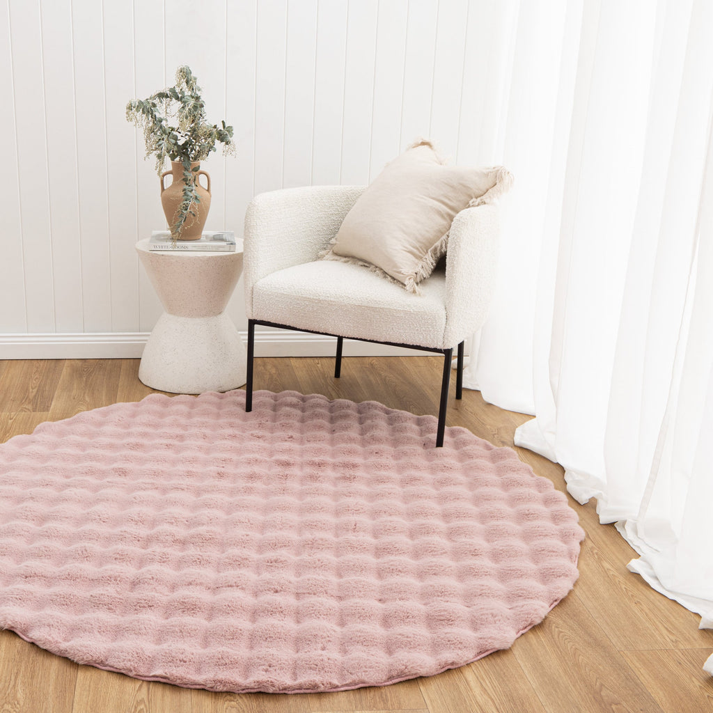 Purity Rose Pink Round Washable Shaggy Rug styled with furniture