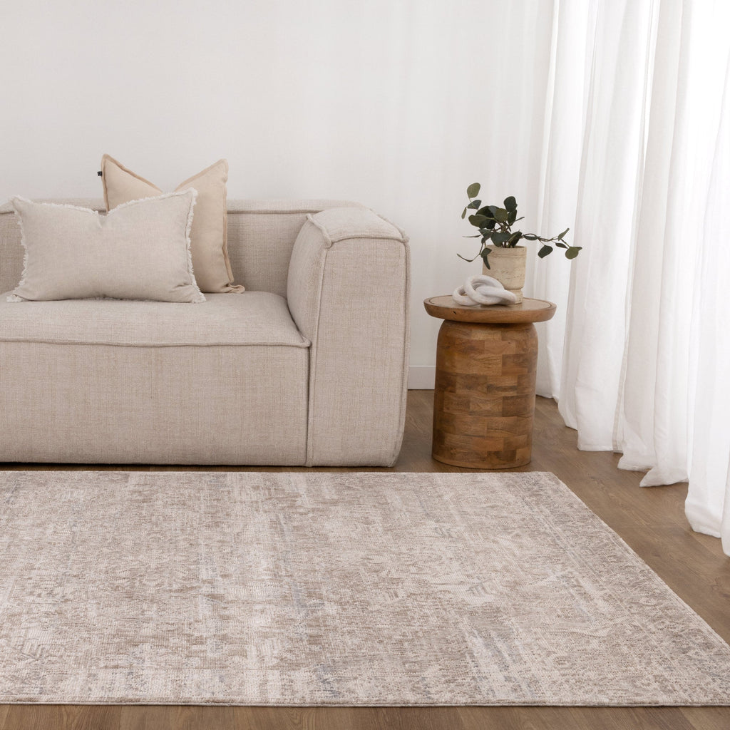 Solenne Beige & Blue Distressed Vintage Rug - S100 styled with furniture