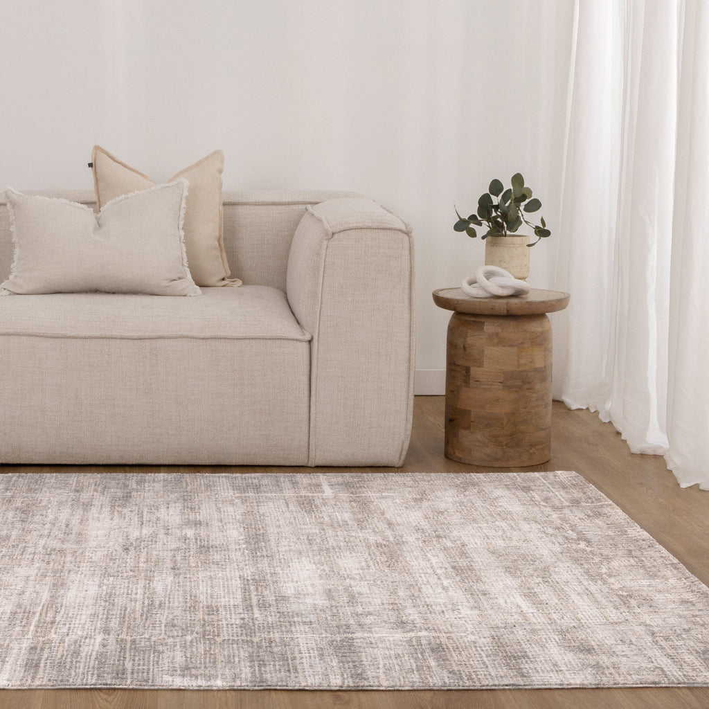 Solenne Cream-Gray Abstract Rug - S500 styled with furniture