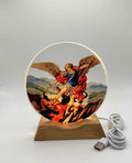 Saint Michael Archangel LED Lamp with detailed illustration of Saint Michael triumphing over evil.