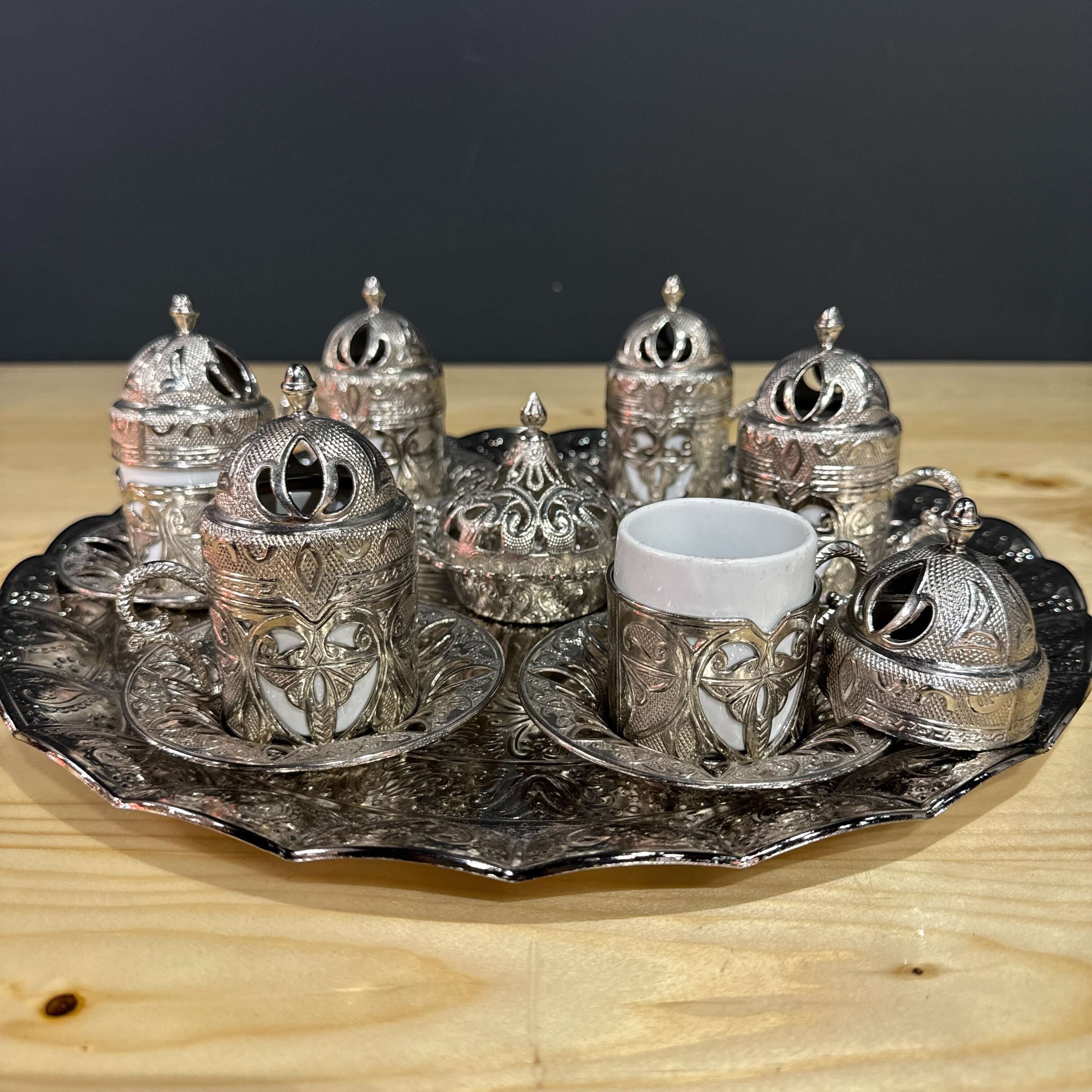 Silver Ottoman-Style Coffee Set featuring intricately detailed silver cups and matching lids for an authentic Turkish coffee experience.