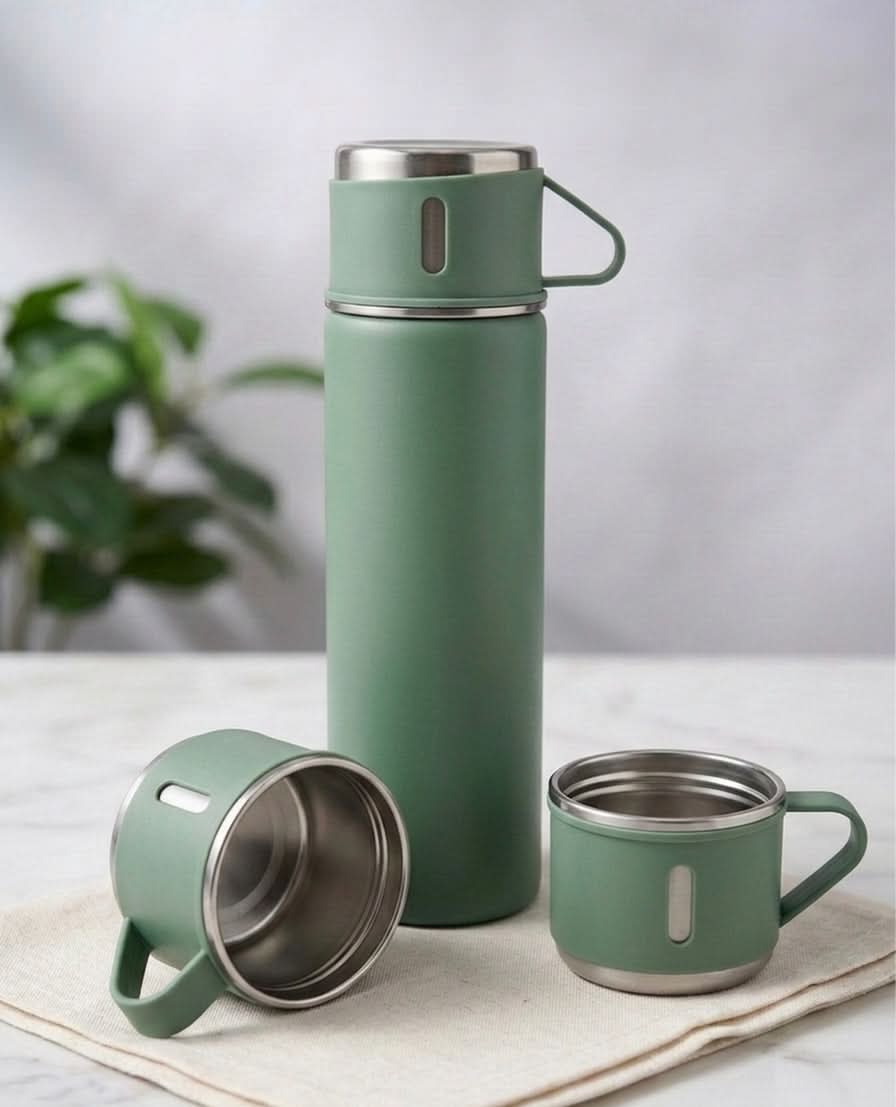 Stainless Steel Vacuum Travel Bottle in green with matching cup on a neutral background, perfect for hot or cold beverages.