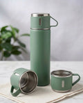 Stainless Steel Vacuum Travel Bottle in green with matching cup on a neutral background, perfect for hot or cold beverages.