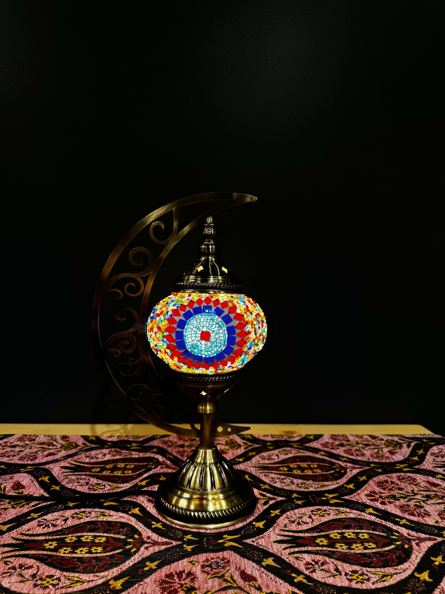 Sunburst Circle Turkish Mosaic Lamp - Crescent Moon Design-Shop the Sunburst Circle Turkish Mosaic Lamp! Features vibrant red, blue, and multicolored circular mosaic design with a crescent moon stand. Includes LED bulb. Perfect for decor or gifting.-Bazaa