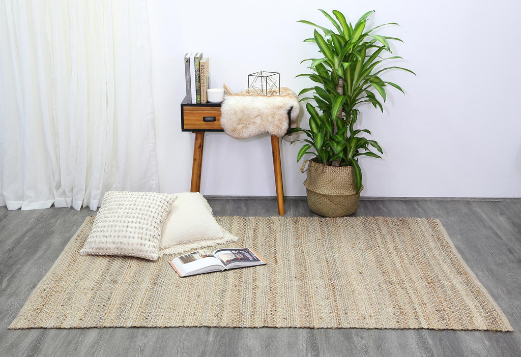 Taj Blue Natural Basket Weave Jute Rug styled with furniture