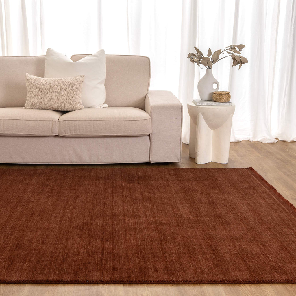Charleston Terra Hand Knotted Wool Blend Rug styled with furniture