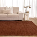 Charleston Terra Hand Knotted Wool Blend Rug styled with furniture