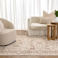 Sierra Beige Oriental Border Rug styled with furniture