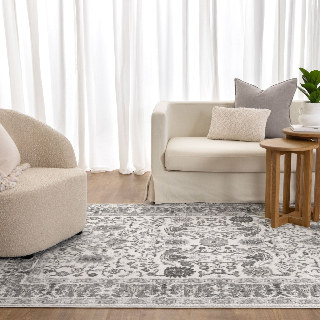 Sierra Grey Oriental Border Rug styled with furniture