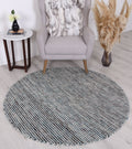 Nordic Teal Reversible Wool Round Rug styled with furniture