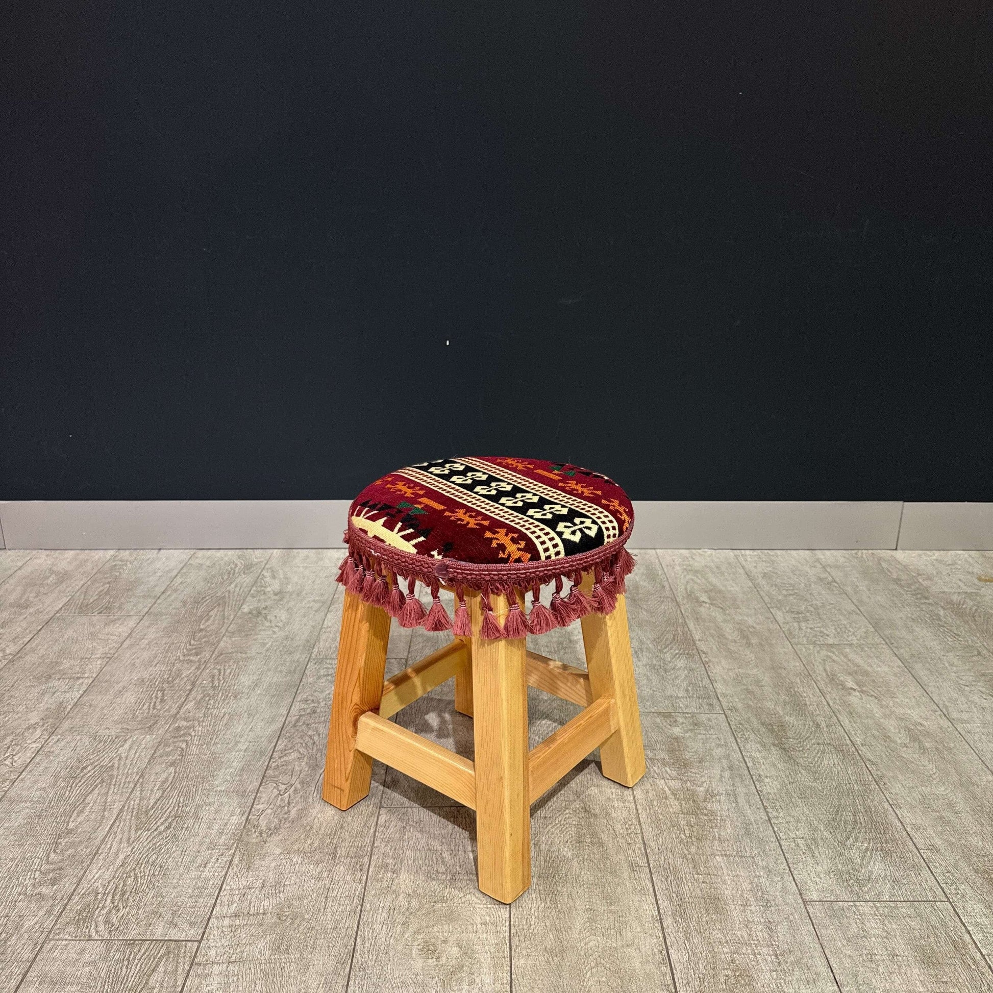 Traditional Stool Maroon-Upgrade your home with the Antep Authentic Chair, a traditional Turkish wooden stool featuring a 100% cotton cushion, firm sponge filling, and intricate ethnic patterns with tassel details. Made from durable Sedir wood in Türkiye,