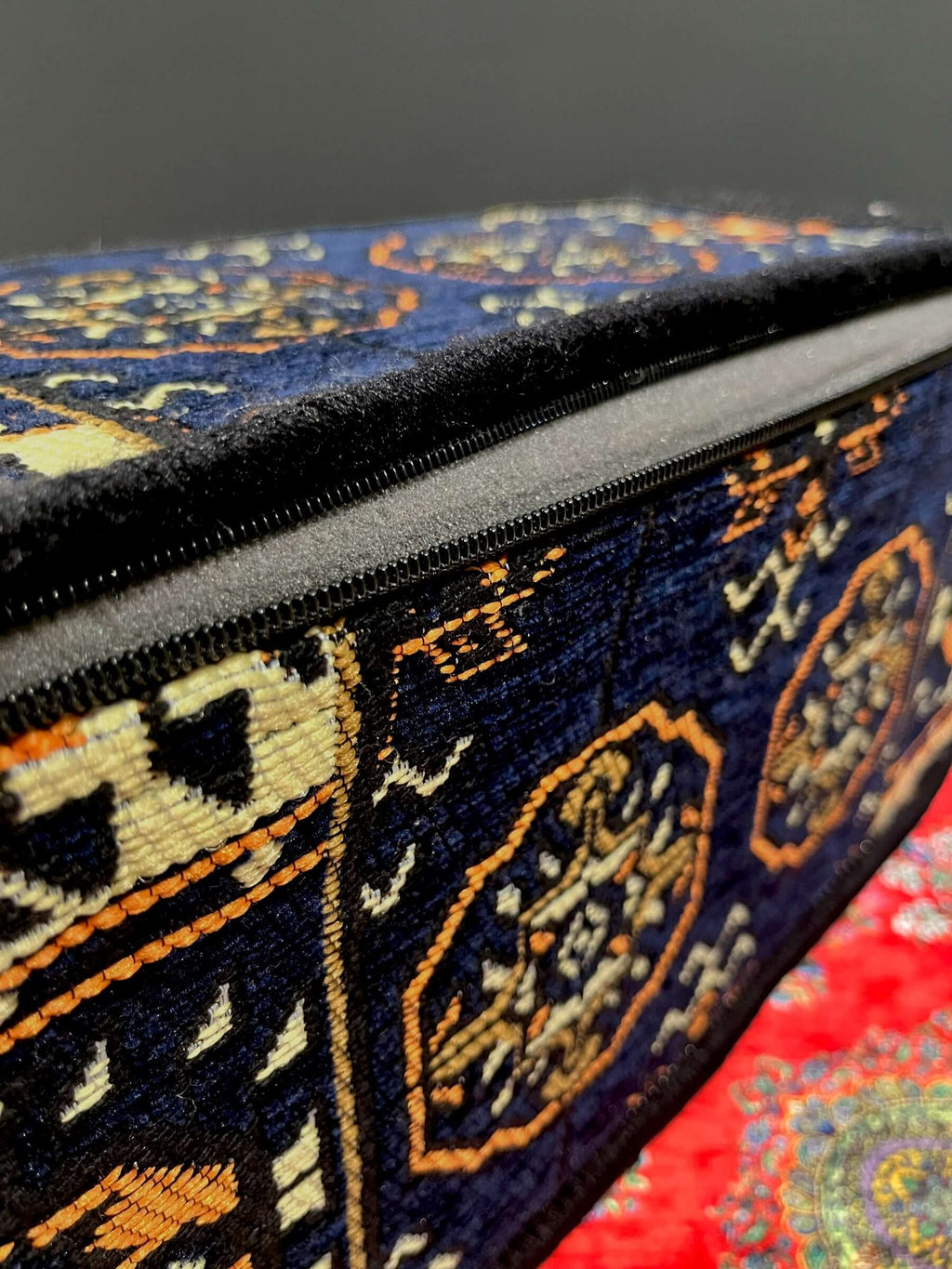 Traditional Turkish Armrest Cushion featuring vibrant navy and patterned fabric.