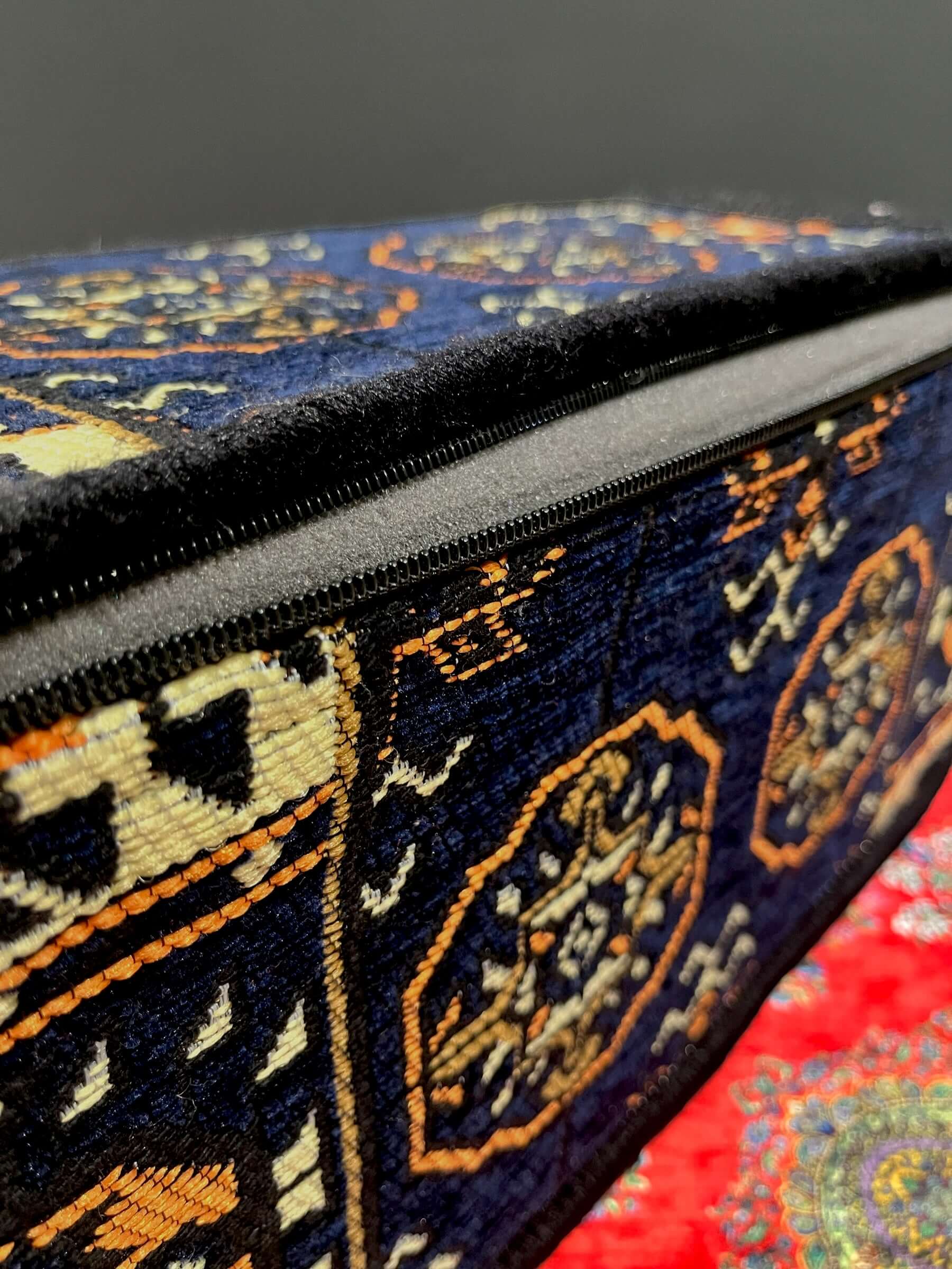 Traditional Turkish Armrest Cushion featuring vibrant navy and patterned fabric.