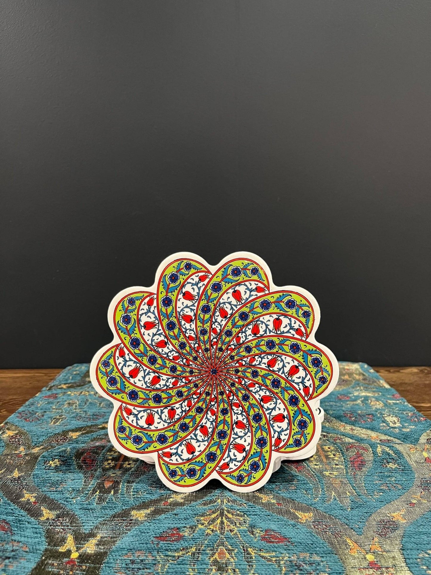 Turkish-made Ceramic Trivet, a fusion of artistry and practicality. Crafted in Turkey, it boasts: Exceptional Durability: Heat-resistant, safeguarding your surfaces. Unique Turkish Design: A mosaic of colors and patterns inspired by Turkish art. Versatile