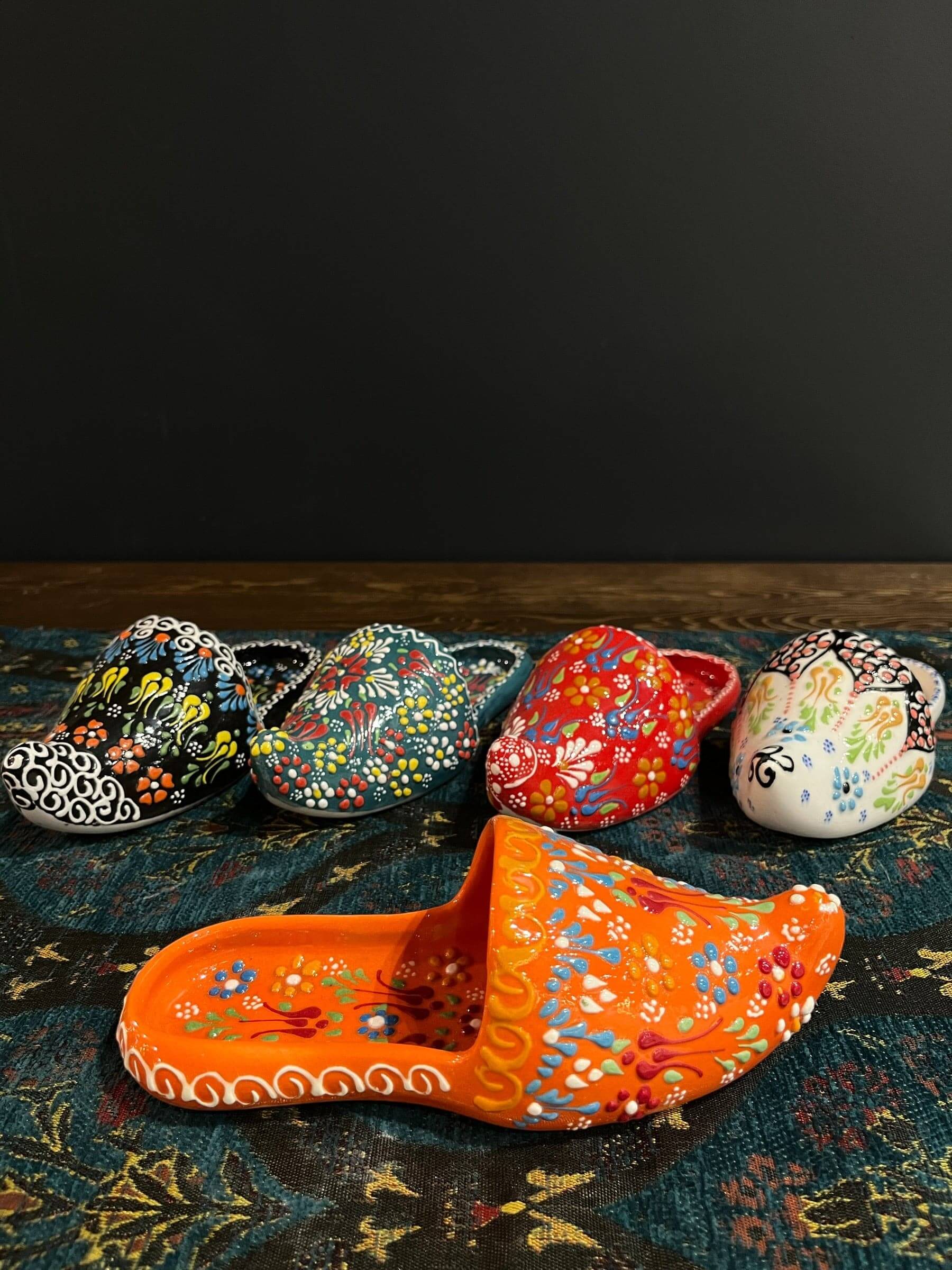 Turkish Ceramic Shoe Vase Orange-Ceramic Shoe Design Vase, expertly crafted in Turkey, where art meets functionality. Crafted from high-quality ceramic, this unique vase adds a touch of elegance to your space. Its intricate design, versatile use, and mult