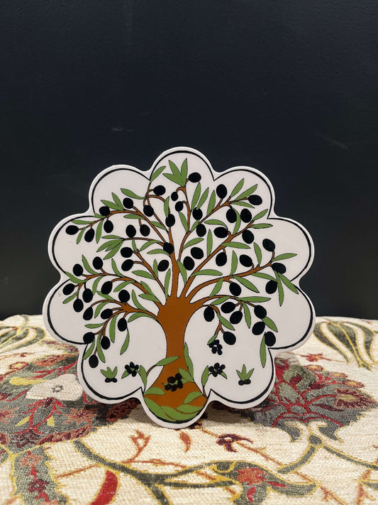 Turkish Ceramic Trivet Olive Tree-Discover our Turkish Ceramic Trivet, a perfect blend of artistry and functionality. Crafted in Turkey, this 18cm heat-resistant trivet protects surfaces and features a vibrant mosaic design inspired by Turkish art. Easy t