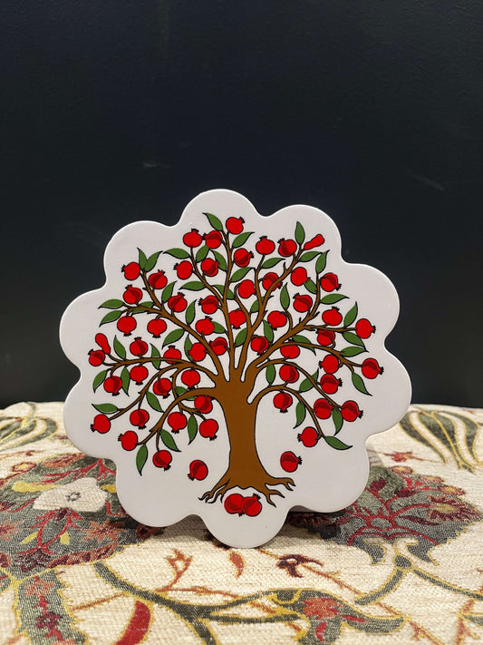 Turkish Ceramic Trivet Pomegranate-Discover our Turkish Ceramic Trivet, a perfect blend of artistry and functionality. Crafted in Turkey, this 18cm heat-resistant trivet protects surfaces and features a vibrant mosaic design inspired by Turkish art. Easy