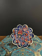 Turkish Ceramic Trivet Red-Blue Tulip-Discover our Turkish Ceramic Trivet, a perfect blend of artistry and functionality. Crafted in Turkey, this 18cm heat-resistant trivet protects surfaces and features a vibrant mosaic design inspired by Turkish art. Ea