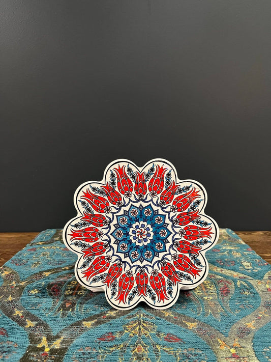Turkish Ceramic Trivet Red Tulips-Discover our Turkish Ceramic Trivet, a perfect blend of artistry and functionality. Crafted in Turkey, this 18cm heat-resistant trivet protects surfaces and features a vibrant mosaic design inspired by Turkish art. Easy t