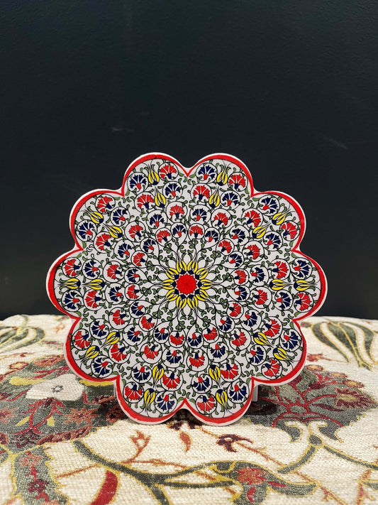 Turkish Ceramic Trivet Red-Yellow-Discover our Turkish Ceramic Trivet, a perfect blend of artistry and functionality. Crafted in Turkey, this 18cm heat-resistant trivet protects surfaces and features a vibrant mosaic design inspired by Turkish art. Easy t