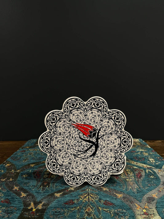 Turkish Ceramic Trivet Tulip-Discover our Turkish Ceramic Trivet, a perfect blend of artistry and functionality. Crafted in Turkey, this 18cm heat-resistant trivet protects surfaces and features a vibrant mosaic design inspired by Turkish art. Easy to cle