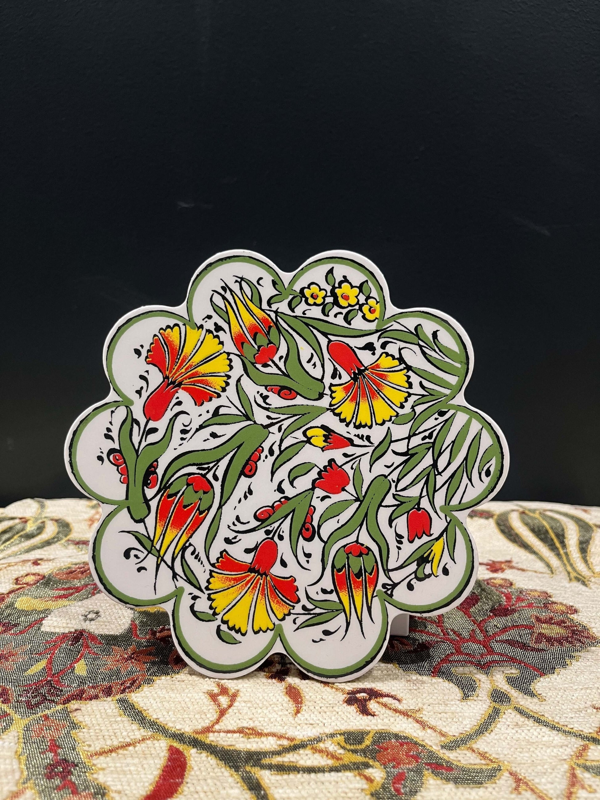 Turkish Ceramic Trivet Yellow-Discover our Turkish Ceramic Trivet, a perfect blend of artistry and functionality. Crafted in Turkey, this 18cm heat-resistant trivet protects surfaces and features a vibrant mosaic design inspired by Turkish art. Easy to cl