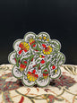 Turkish Ceramic Trivet Yellow-Discover our Turkish Ceramic Trivet, a perfect blend of artistry and functionality. Crafted in Turkey, this 18cm heat-resistant trivet protects surfaces and features a vibrant mosaic design inspired by Turkish art. Easy to cl