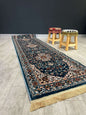 Turkish Traditional Hallway Runner Blue H3846A-Discover the perfect blend of tradition and modernity with our Turkish polyester rug. Featuring a rich blue background with intricate patterns, this durable, easy-to-maintain rug adds elegance to any space. I