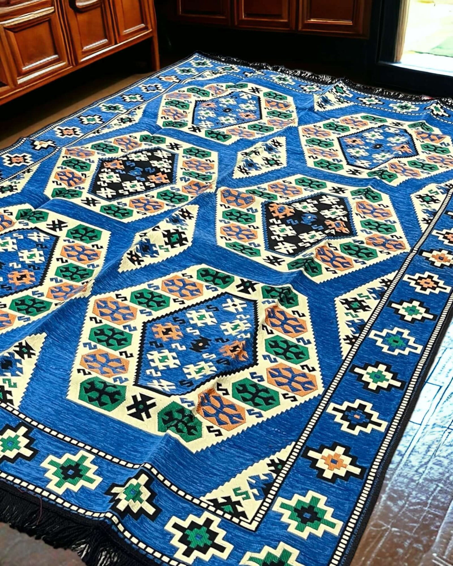 Turkish Kilim Rug (Majlis Blue Classic)-the perfect match for your divan set and floor cushions. Crafted from 100% cotton in Turkey, this rug seamlessly complements your living space with its captivating geometric pattern and practical design. Not only do